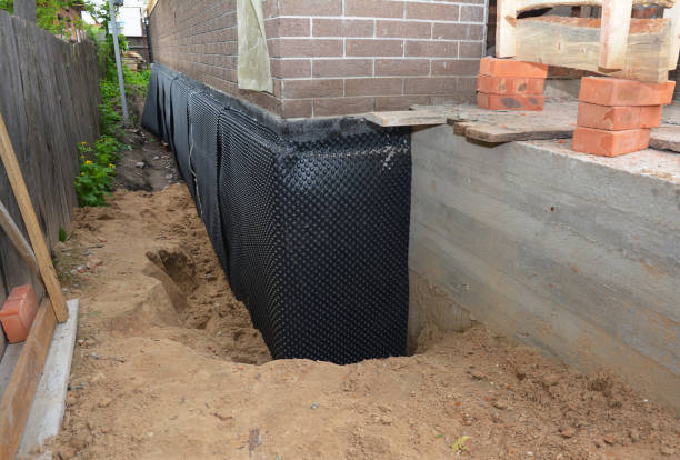 Happy homeowners after waterproofing job in Apison